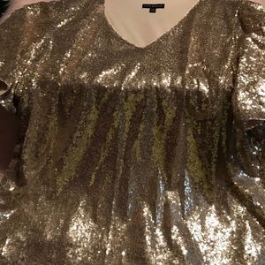 Gold sequins top.